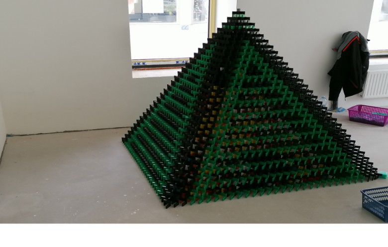 Most dominoes toppled in a 3D pyramid | Guinness World Records